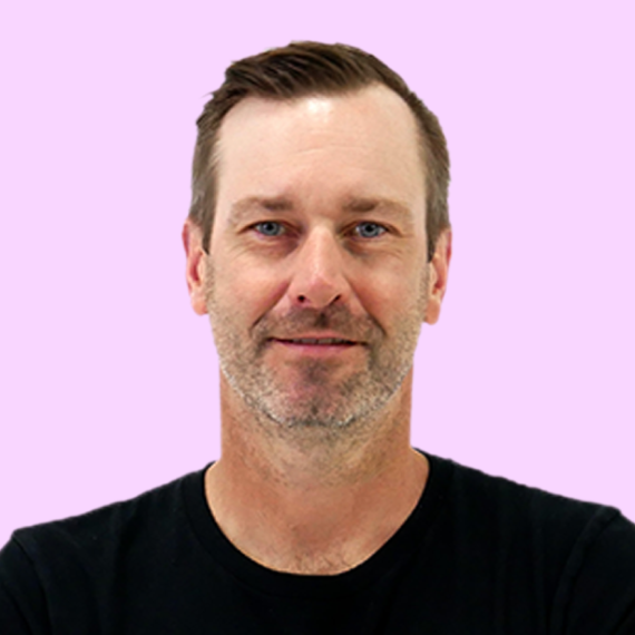 Tim-Glomb-Purple-Headshot